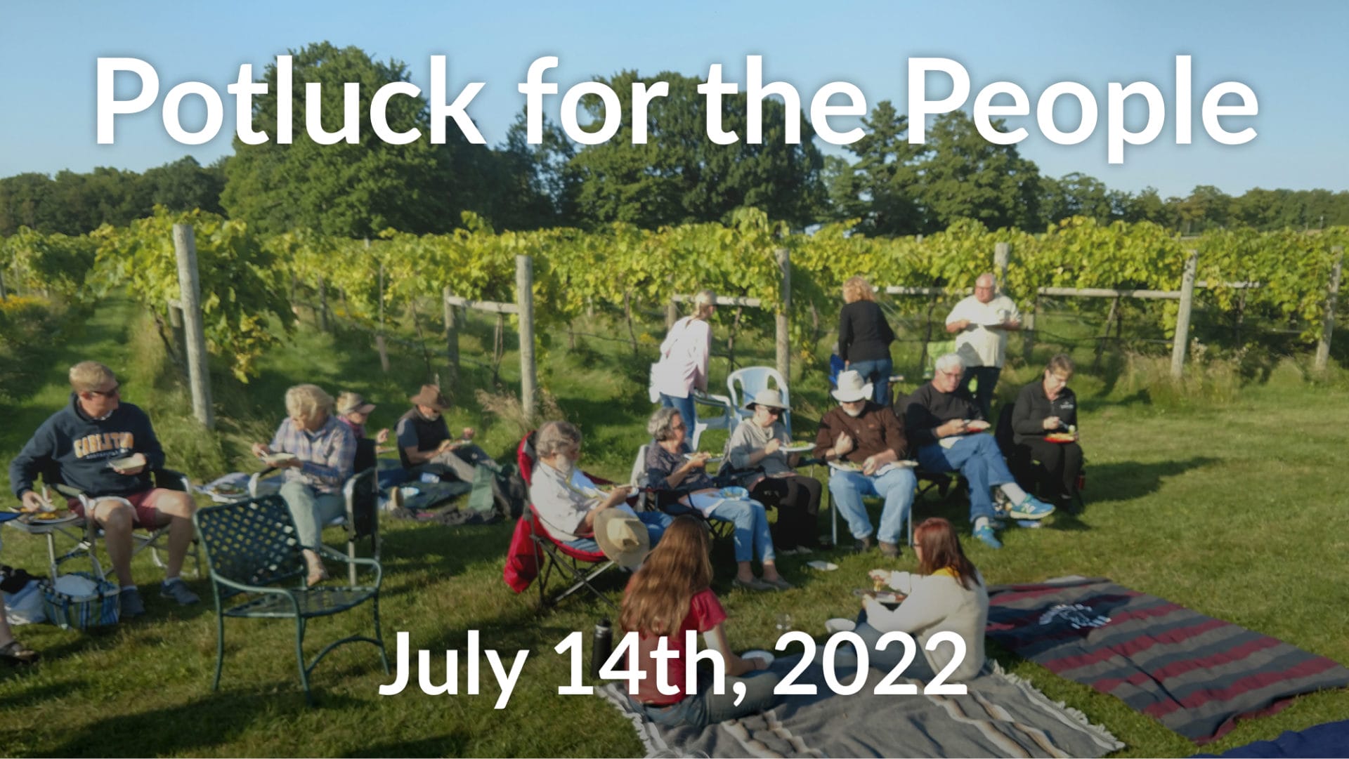 sixteen people sitting in chairs and on picnic blankets in front of the vineyard, sharing a potluck meal, with text that reads "Potluck for the People, July 14th, 2022"