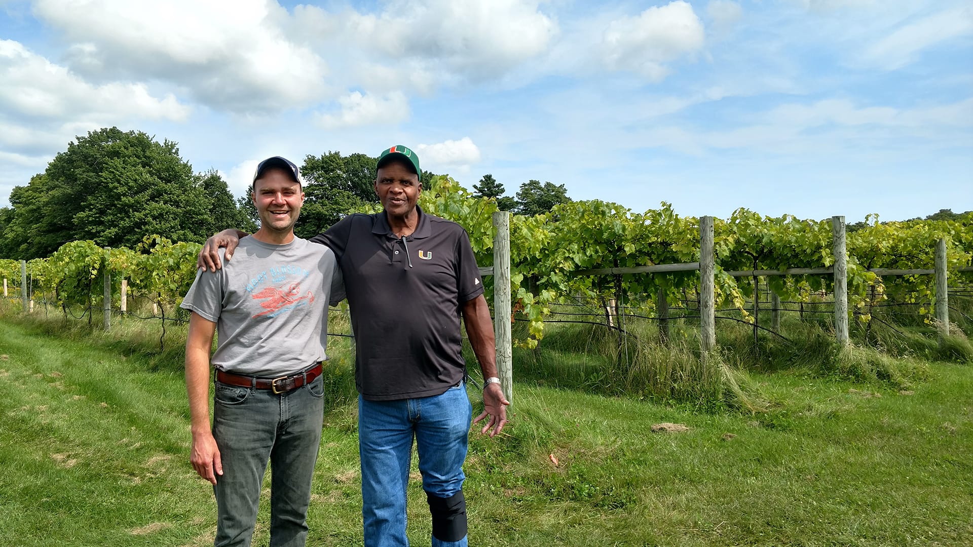 Russell Rolffs and Will Allen in the vineyard