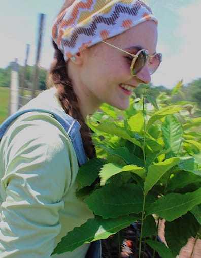 2021 intern Sophia planting trees