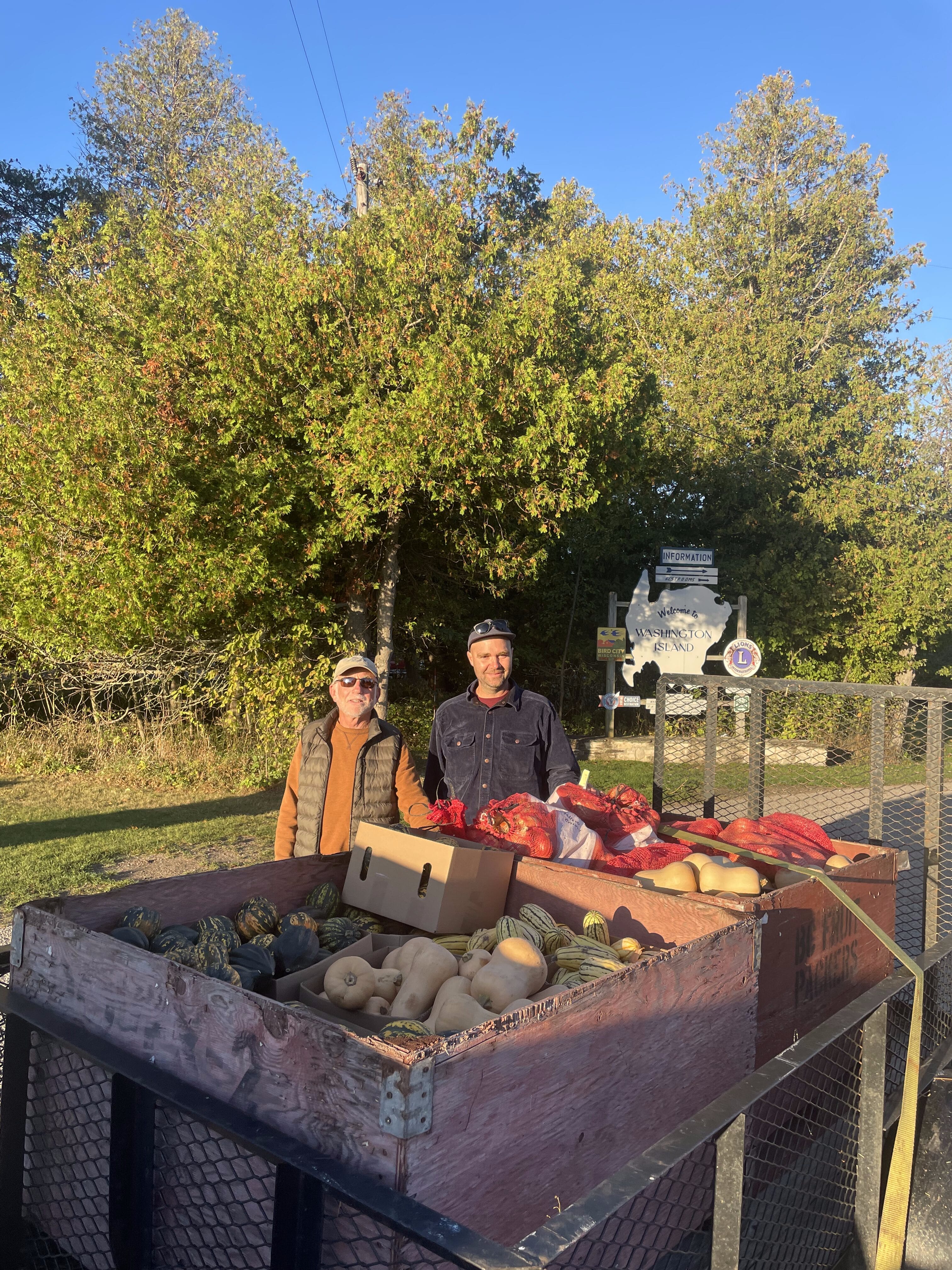 Russell and Dan deliver produce to food pantries